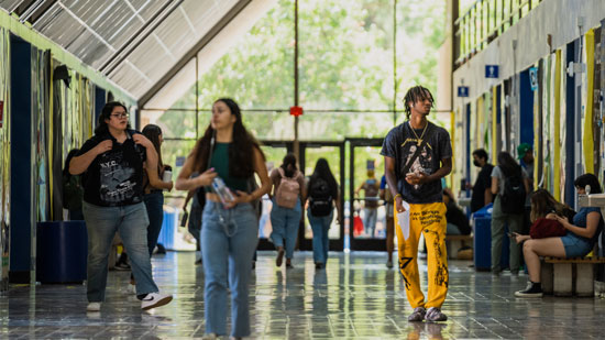 Students walking through Dorothy Donahoe Hall